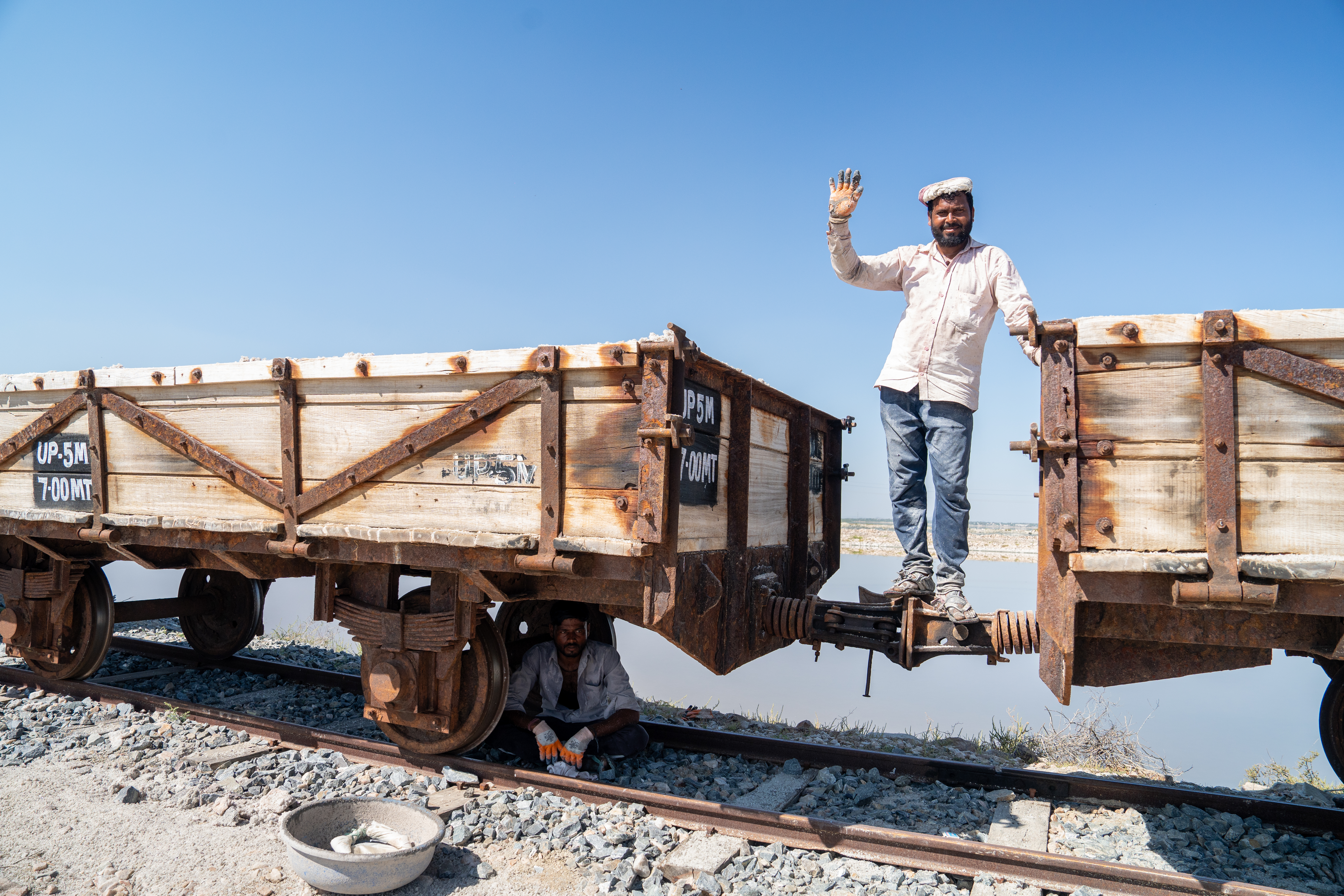Salt harvesters at work on the brine beds of Sambhar Lake, Rajasthan